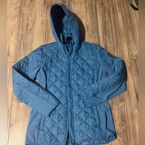 Skechers woman’s Quilted Hooded Jacket in Blue. Size L